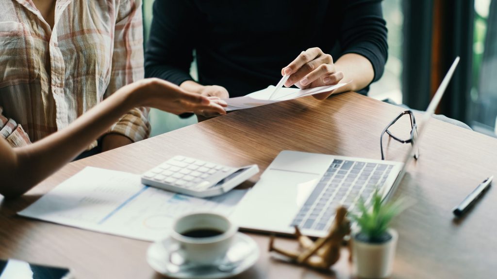 Close up of colleagues hands